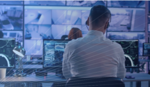 security professional looking at monitors